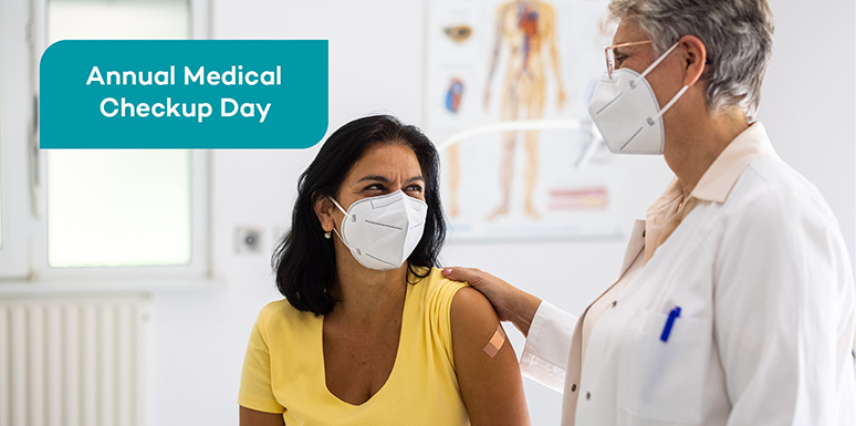 Female patient in mask talking to doctor